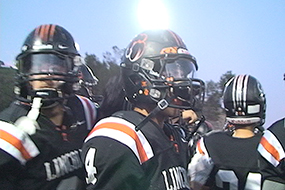 Lincoln Varsity football team fights for playoff birth